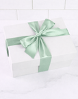 luxury white gift box with satin sage bow